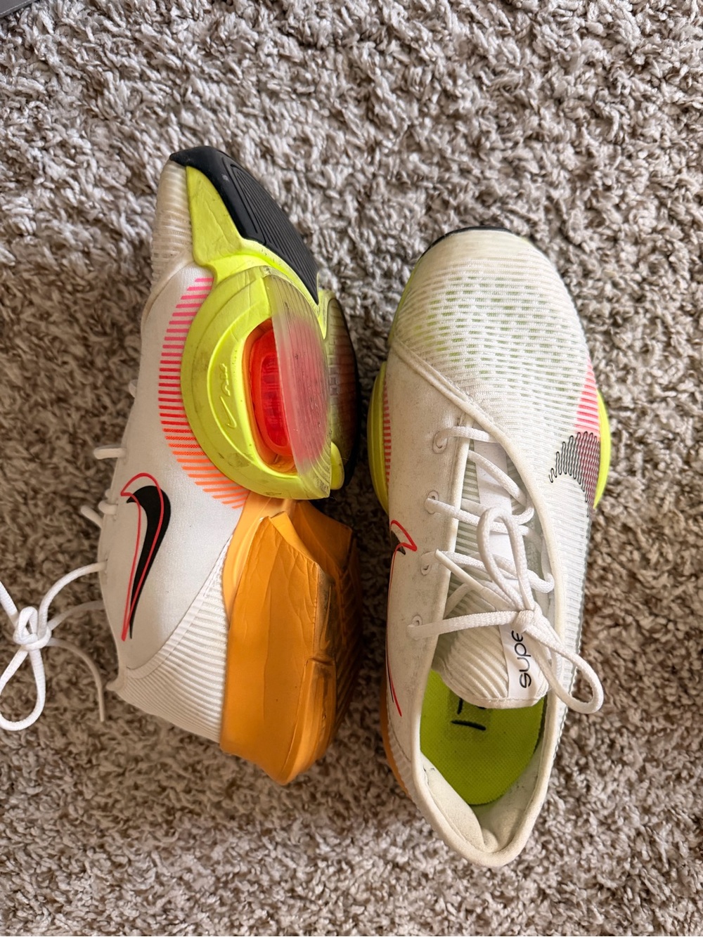 Nike White Sneakers with Neon Yellow and Orange Accents